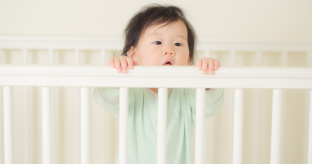 Baby Standing in Crib