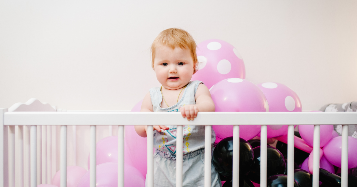 Baby Standing in Crib